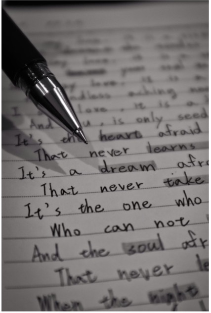 Writer at work revising manuscript